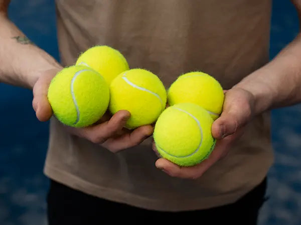 Balls, grips, overgrips and accessories